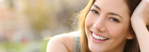 Smiling woman representing successful chiropractic care results